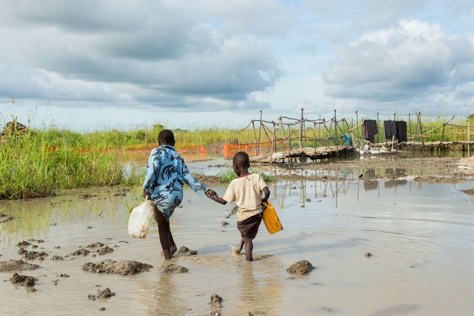 The POC site in Bentiu, South Sudan, which houses over 40,000 displaced persons, sprung up to shelter civilians seeking shelter from armed conflict, and has seen significant flooding during the rainy season, due to the fact that is located on a flood plain. The POC site in Bentiu, South Sudan, which houses over 40,000 displaced persons, sprung up to shelter civilians seeking shelter from armed conflict, and has seen significant flooding during the rainy season, due to the fact that is located on a flood plain.