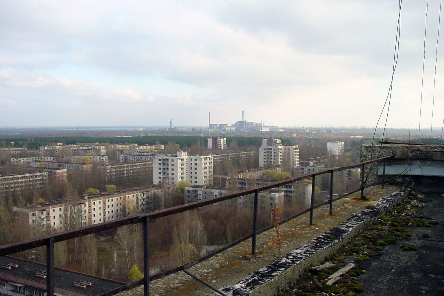 View of Chernobyl power plant taken from roof of building in Pripyat Ukraine.