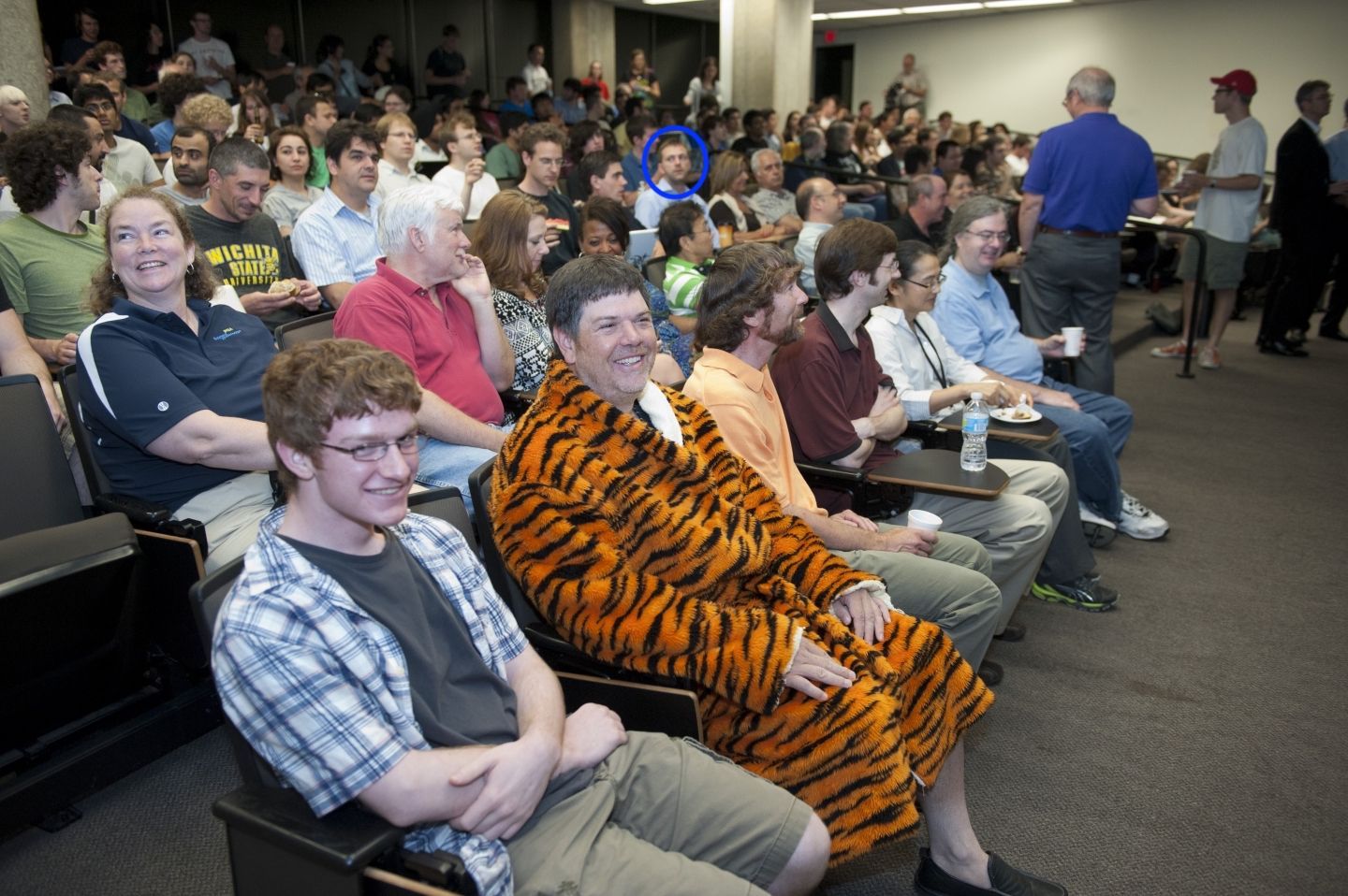 Ben Kilminster (circled) watching the announcement of the Higgs discovery in the middle of the night at Fermilab Ben Kilminster (circled) watching the announcement of the Higgs discovery in the middle of the night at Fermilab