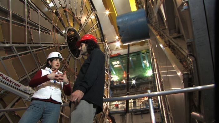 Two protagonists of 'Particle Fever': Fabiola Gianotti and David Kaplan in the subterrestrial caverns of the ATLAS experiment at CERN in Geneva.