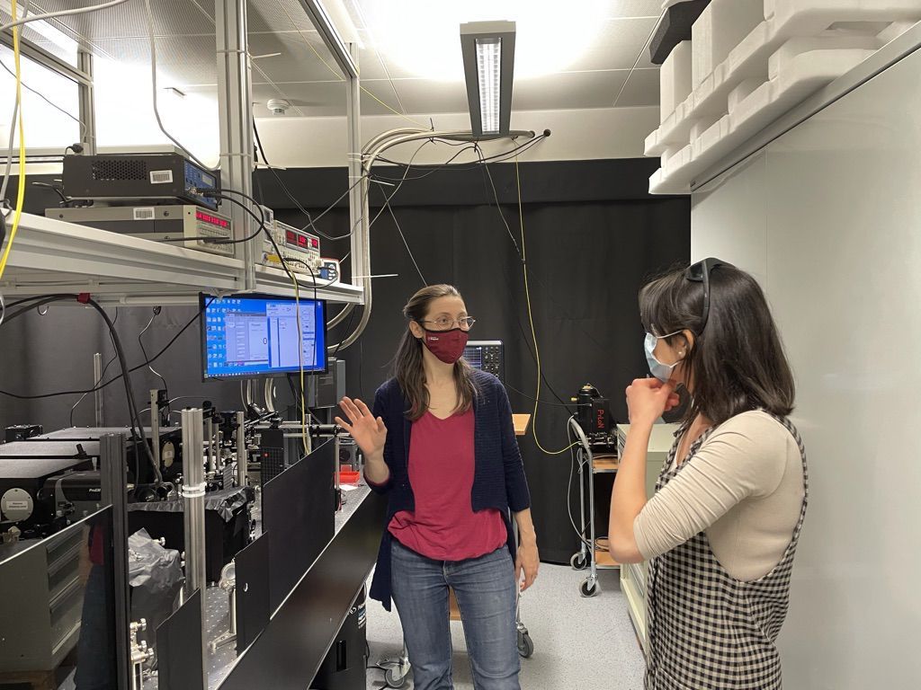 Ilaria Zardo with a research assistant in the physics laboratory of the University of Basel.