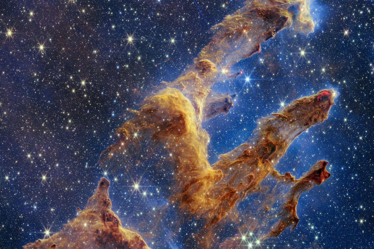 Die «Pillars of Creation» sind mehrere tausend Lichtjahre von der Erde entfernt, bestehen aus Gas und Staub und sind ein Entstehungsgebiet für neue Sterne.