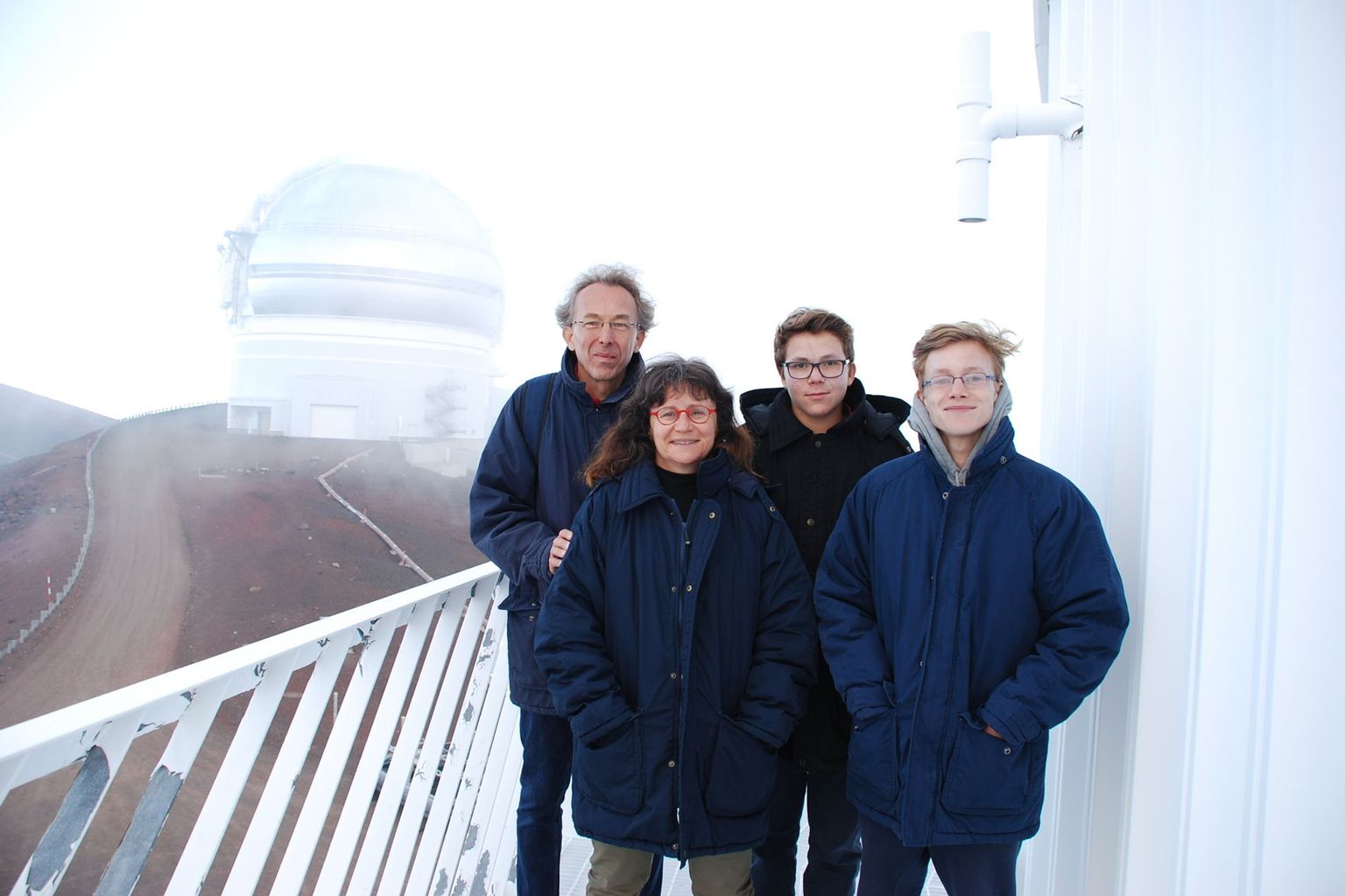 Corinne Charbonnel with her husband Daniel Schaerer and their two sons in front of the Canada-France-Hawaii telescope on the summit of the extinct volcano Mauna Kaa in Hawaii. The Centre National de la recherche scientifique (CRNS), a French research institution for which Corinne Charbonnel used to work, is a partner of the telescope. To balance her professional activities, the scientist pursues a number of hobbies, including reading, hiking, yoga and making music with her electric guitar.
