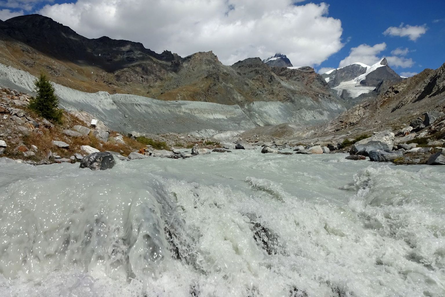 A lot of melt water pours into the valley from under the Findel Glacier (Valais).