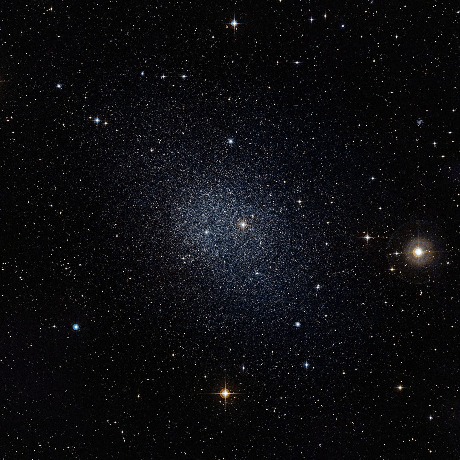 One of the dwarf galaxies which is orbiting around our Milky Way galaxy as part of a planar structure.